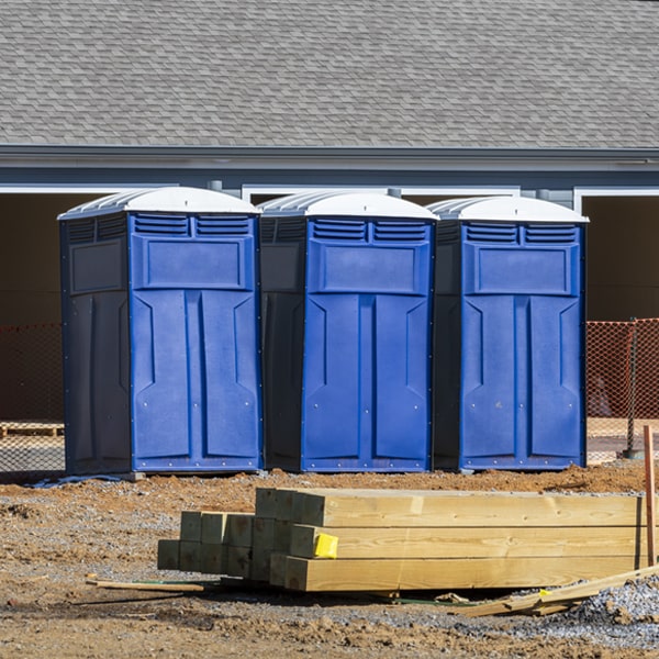 what is the cost difference between standard and deluxe porta potty rentals in Buckner AR